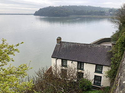 Dylan Thomas's Boathouse at Laugharne overlooking the Taf Estuary.