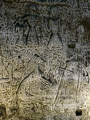 Stone carving of a Sheela-na-gig at Royston Cave.