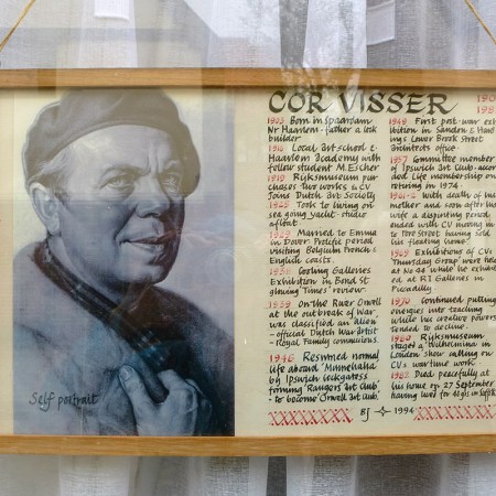 Cor Visser self portrait in window of 44 Fore Street, Ipswich.
