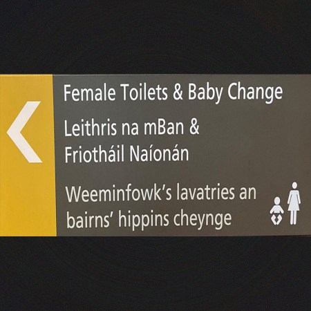 Sign in Ulster-Scots language for the toilets.