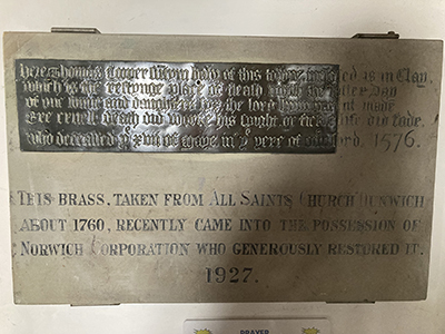 Brass plaque from All Saints' Church, Dunwich.
