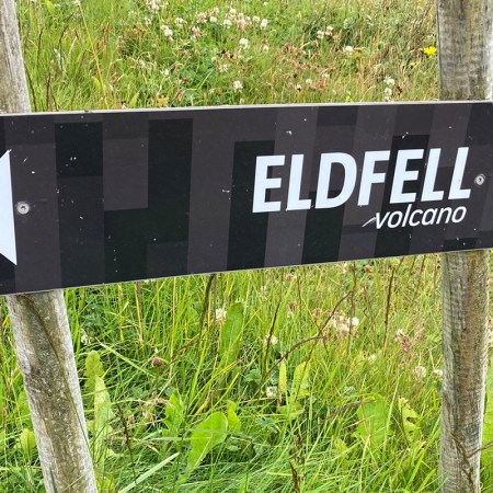 A sign to Eldfell volcano on Heimaey on the Westman Islands, Iceland.