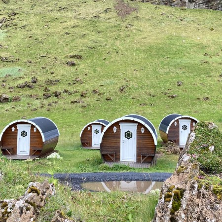Barrel glamping pods at the Vestmannaeyjar campsite on Heimaey in the Westman Islands.