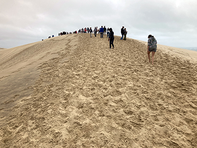 Crowded summit of Dune of Pilat.