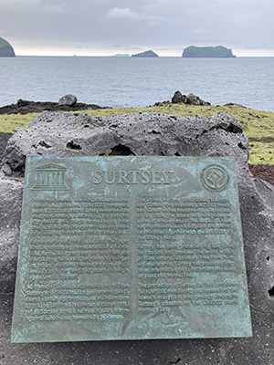 Surtsey and UNESCO World Heritage plaque.