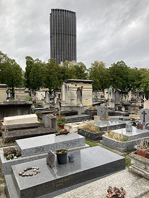 Montparnasse Cemetery with Montparnasse Tower in the background.