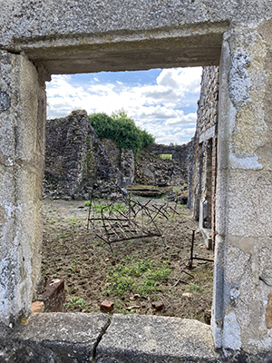 Old bed frame in Oradour.