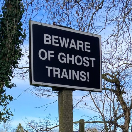 Ghost trains signpost on the Alban Way abandoned railway line between St Albans and Hatfield.