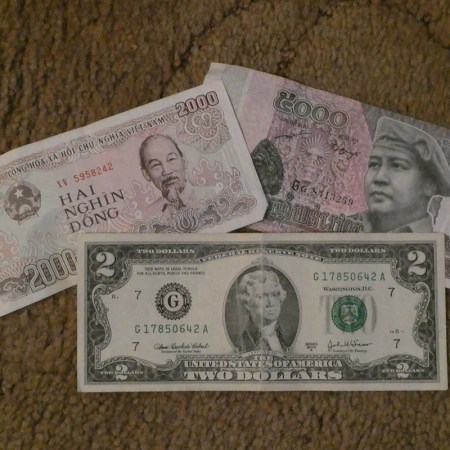 US Dollars, Vietnamese Dong and Cambodian Riel.